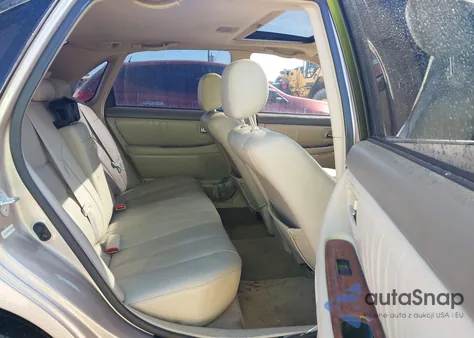 2004 Toyota Avalon Xls z USA, uszkodzony, nr VIN 4T1BF28B84U347045